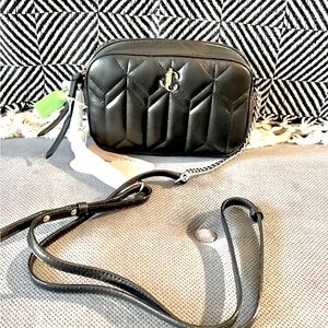 Authentic Jimmy Choo shoulder bag. Made with genuine leather.